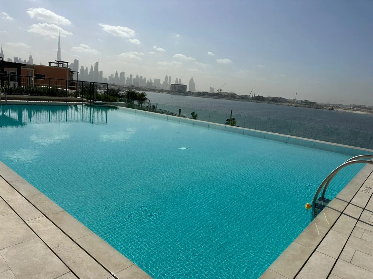 Elegant 1-Bedroom | Pool & Sea Views